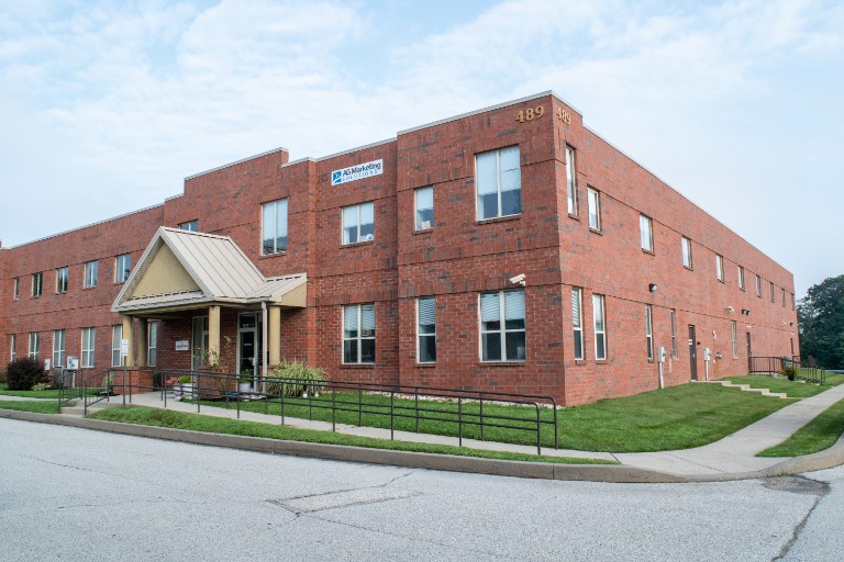 Exterior building and sign picture of AG Marketing Solutions' office that is located outside of Philadelphia